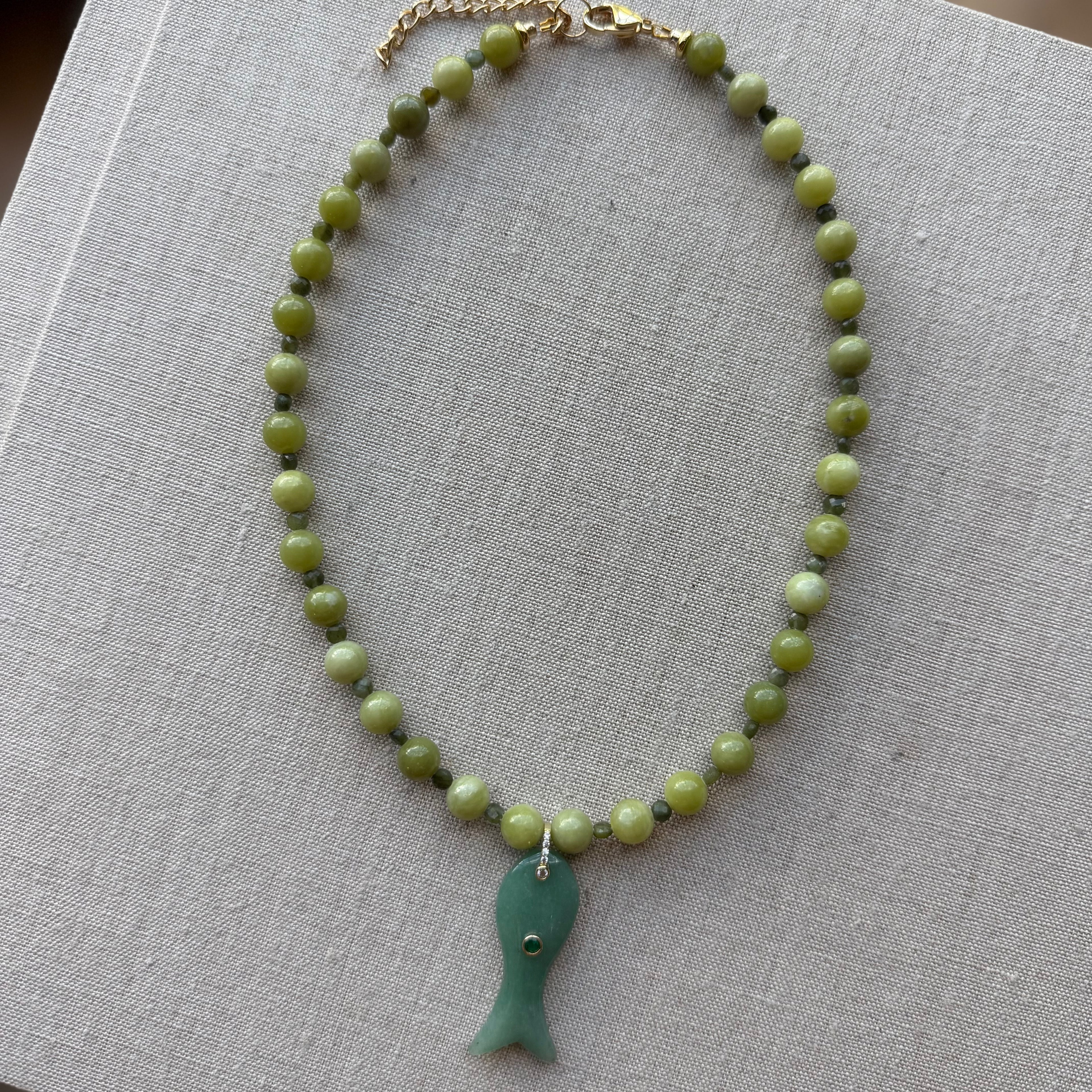 green fish necklace